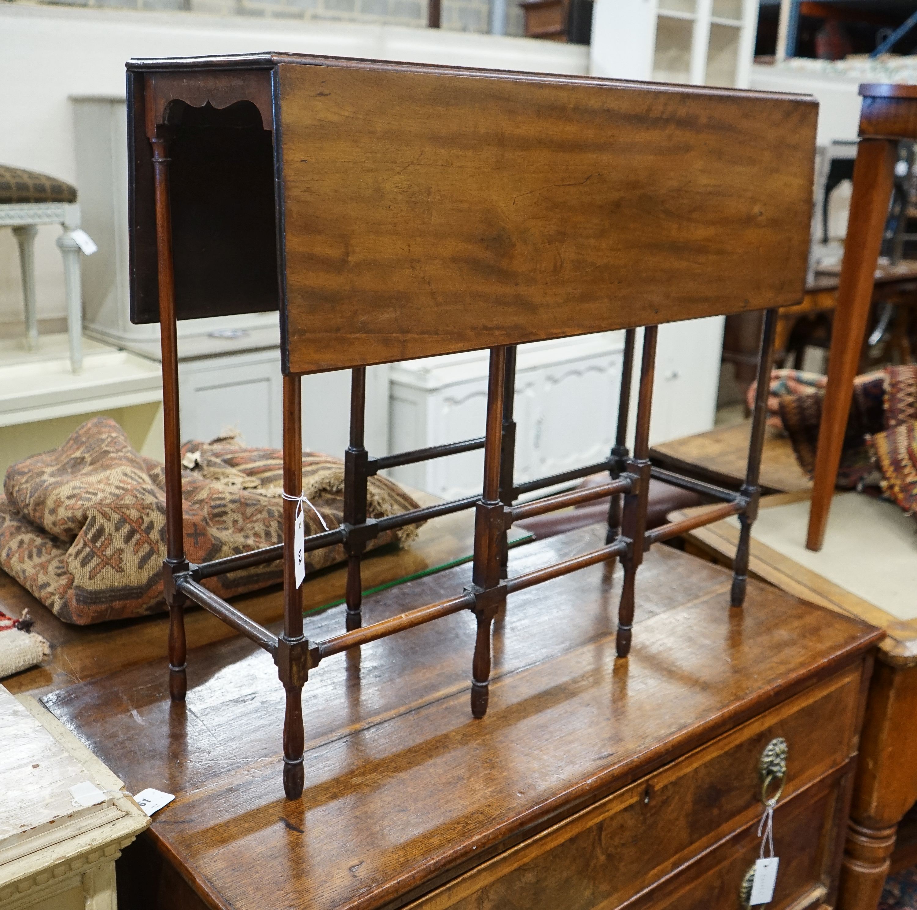 An Edwardian mahogany spider leg table, width 83cm, depth 29cm, height 72cm